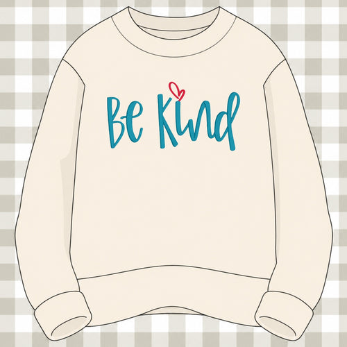 Cream crewneck sweatshirt with embroidered teal Be Kind script lettering and a small red heart